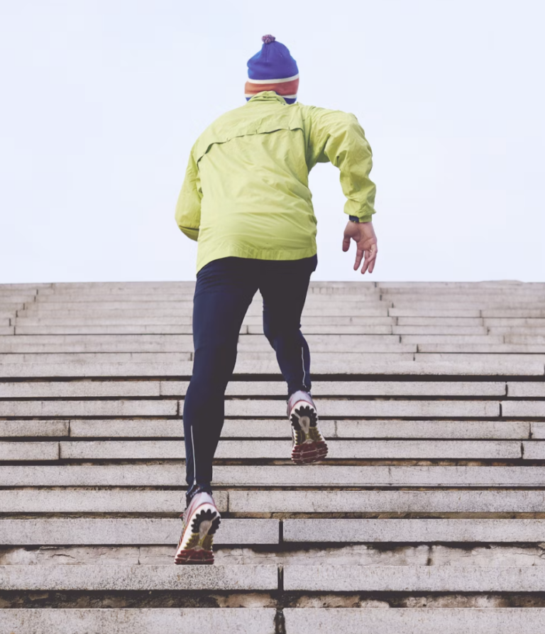 Lifestyle image of someone running up the stairs