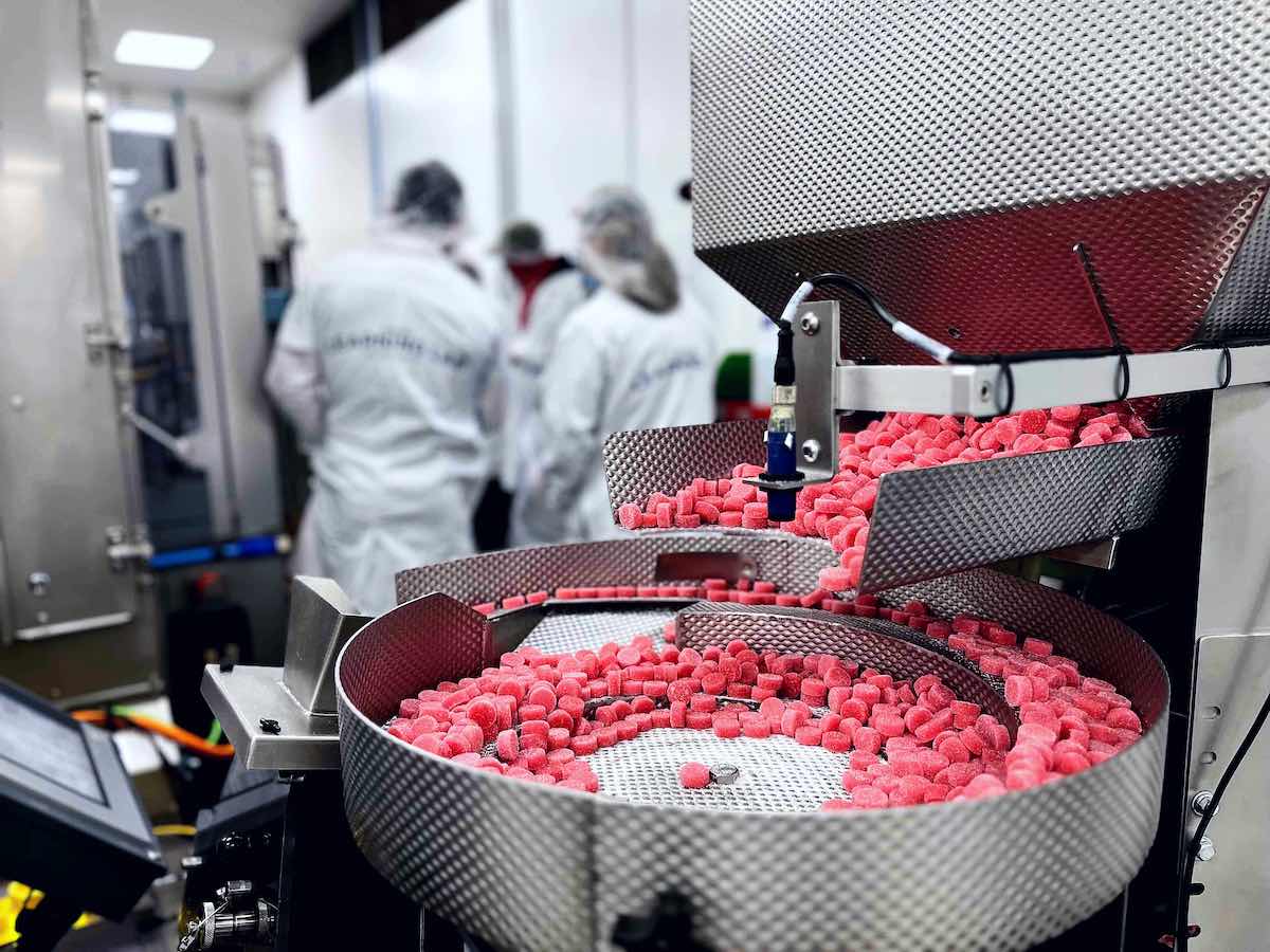 KANHA Life Fast-acting NANO NANO Hybrid Watermelon THC Gummies in production at the warehouse facility.