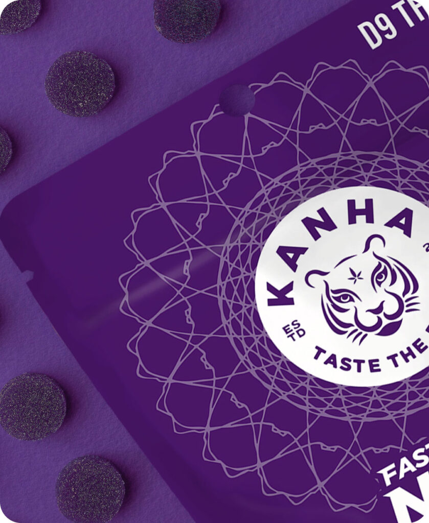 Image of KANHA Life Fast-Acting NANO Indica Grape Gummies - packaging next to a line up of the gummies